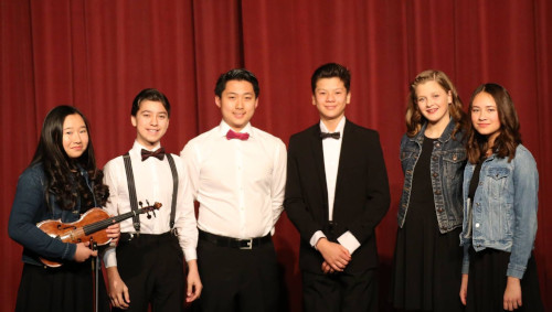 Student Richard with his friends performing at the Westlake Highschool